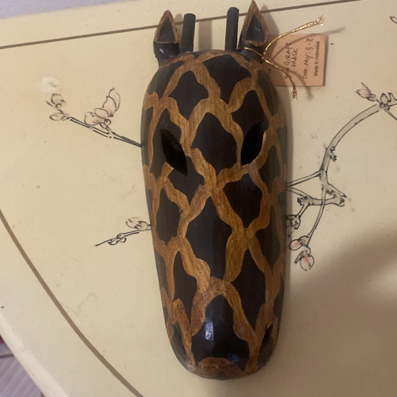 Hand Painted Wooden African Animal Wall Decor
Giraffe Mask Made in Indonesia - Picture 3 of 12